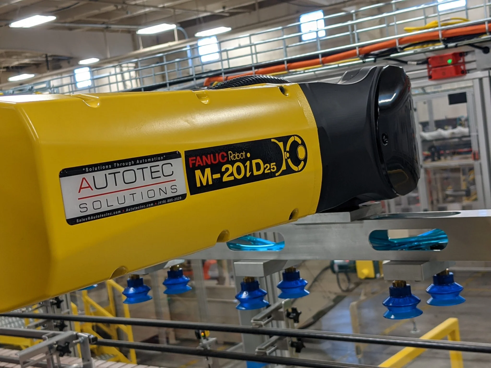 Autotec Solutions | Fanuc M-20iD25 pick and place robot up close
